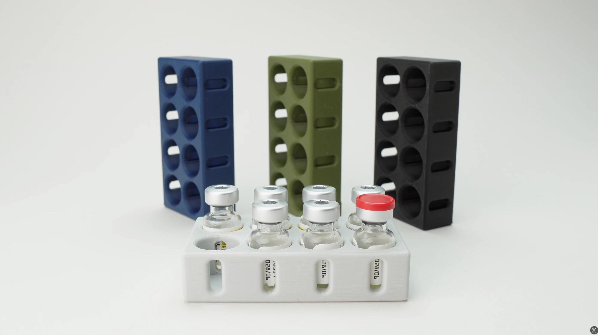 TASH LAB vial holders in navy, green, black and grey